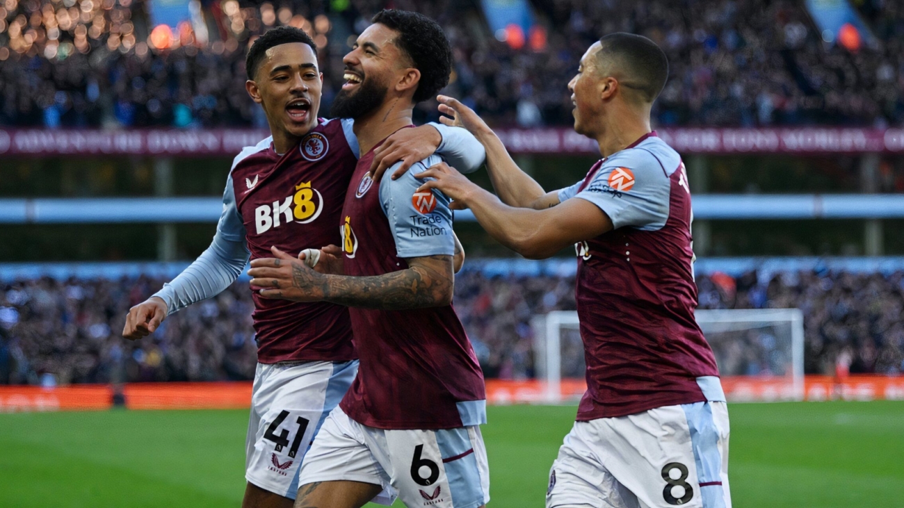 douglas-luis-jacob-ramsey-and-youri-tielemans-celebrate.jpg