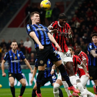 ac-milan-s-tammy-abraham-in-action-with-inter-milan-s-benjamin-pavard.JPG