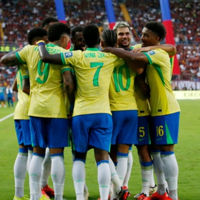 brazil-s-raphinha-celebrates-scoring-their-first-goal-with-teammates.JPG
