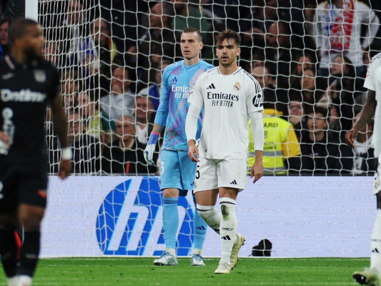 real-madrid-s-andriy-lunin-and-raul-asencio-reacts-after-leganes-diego-garcia-scores-their-first-goa.jpeg