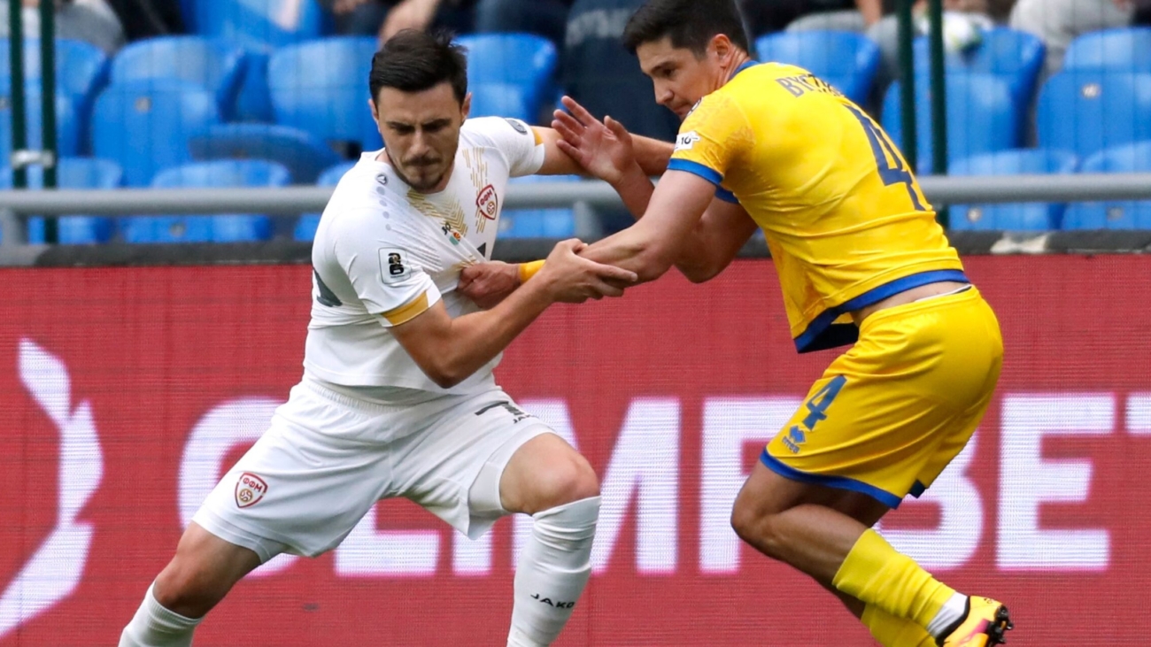 kazakhstan-s-marat-bystrov-in-action-with-north-macedonia-s-eljif-elmas.JPG